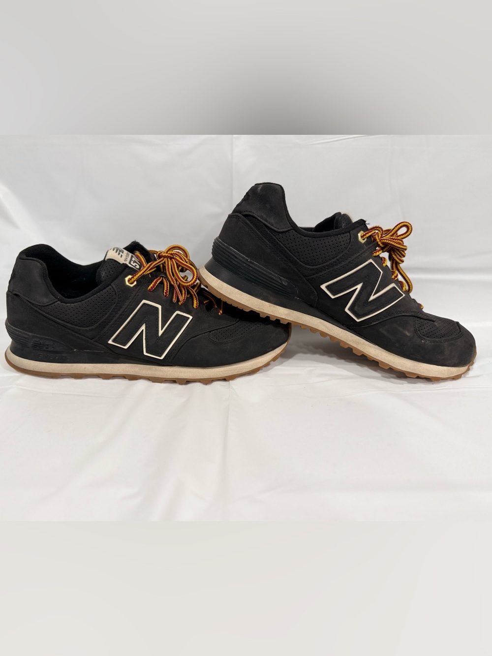 New Balance 574  Men's Black Sneakers with Cream Midsoles and Gum Outsoles